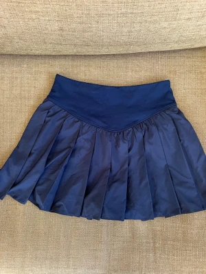 TENNISKJOL - Freepeople tenniskjol med underbyxa. Använd en gång 