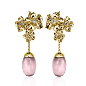 Guldörhängen med blommor och rosa stenar - SÖKER dessa örhängen från Ioaku! Kan betala fullpris 🩷🙏 Hör av dig om du vill sälja eller byta (Jag har med vit sten, oanvända) 💛