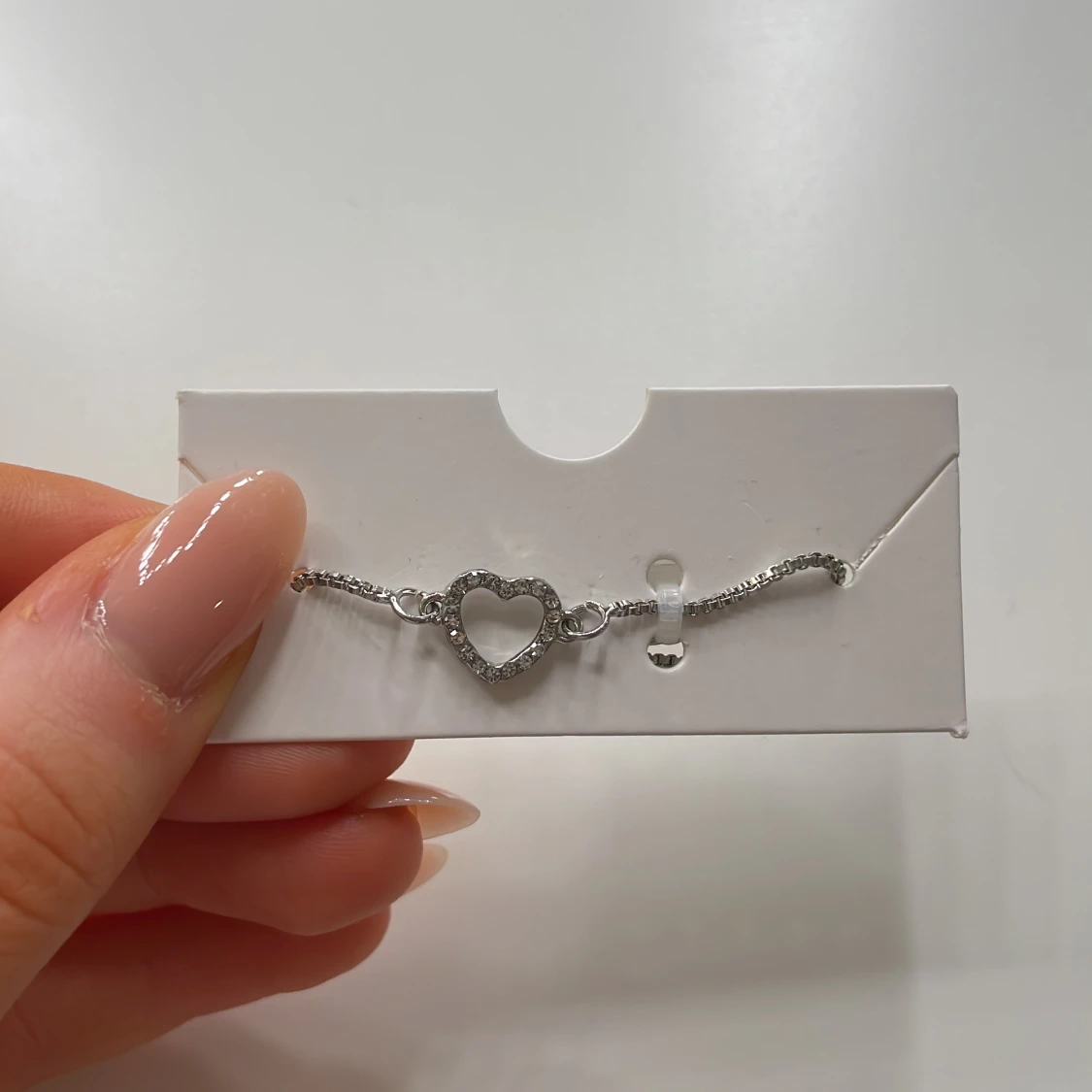 Silverarmband med diamanthjärta