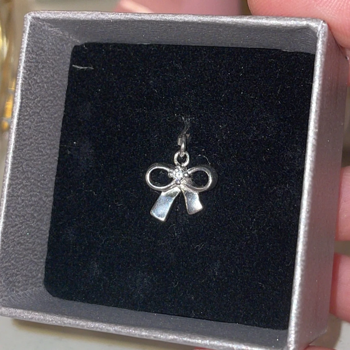 Berlock i äkta silver med rosett - 90