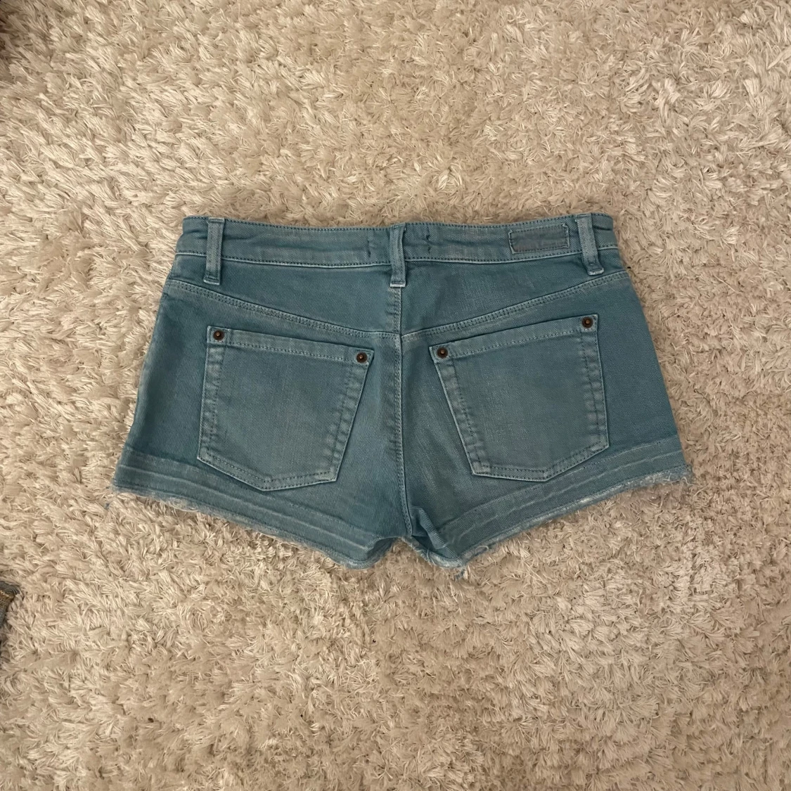 Blå jeansshorts från odd Molly  - 90