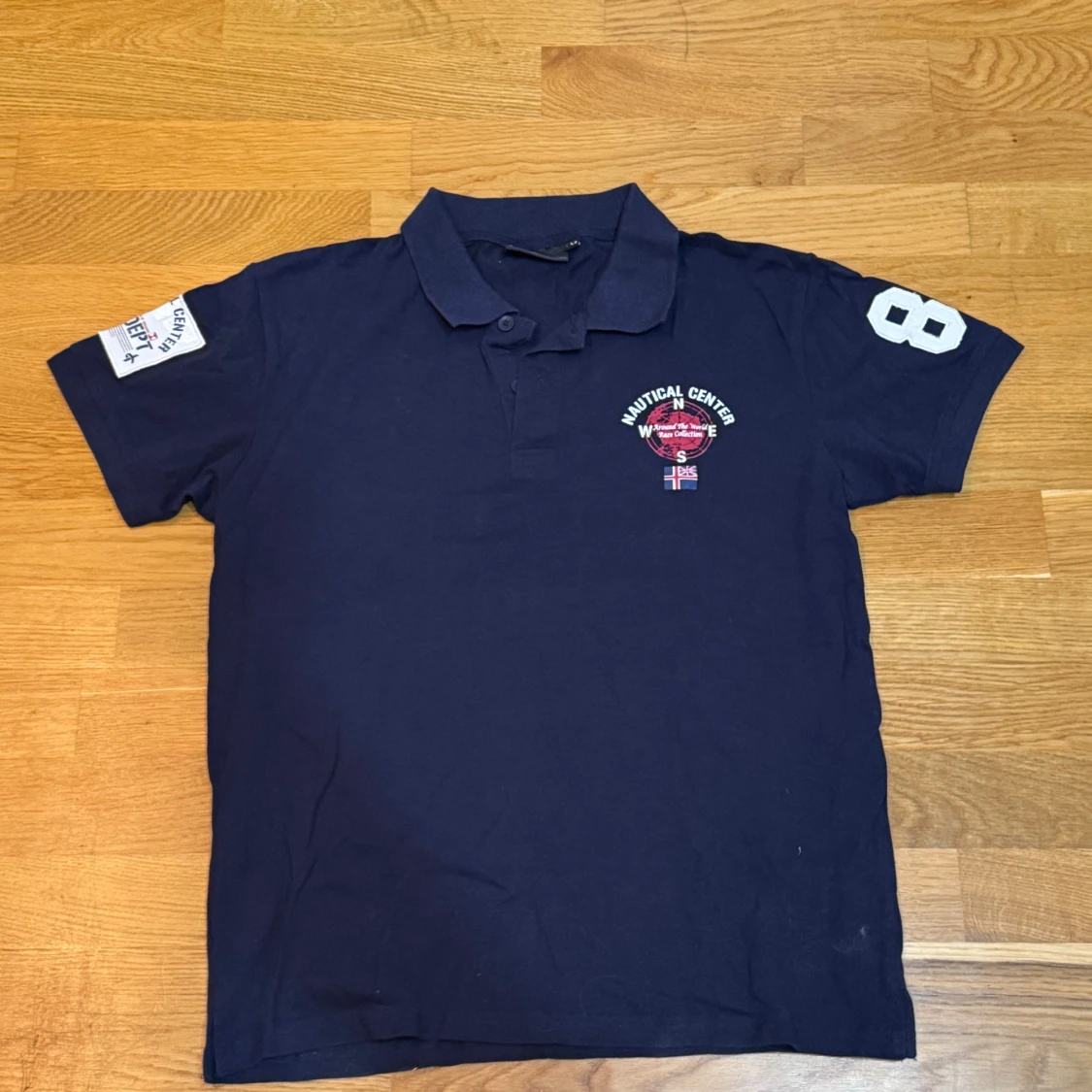 Marinblå pikétröja från Cross Sportswear