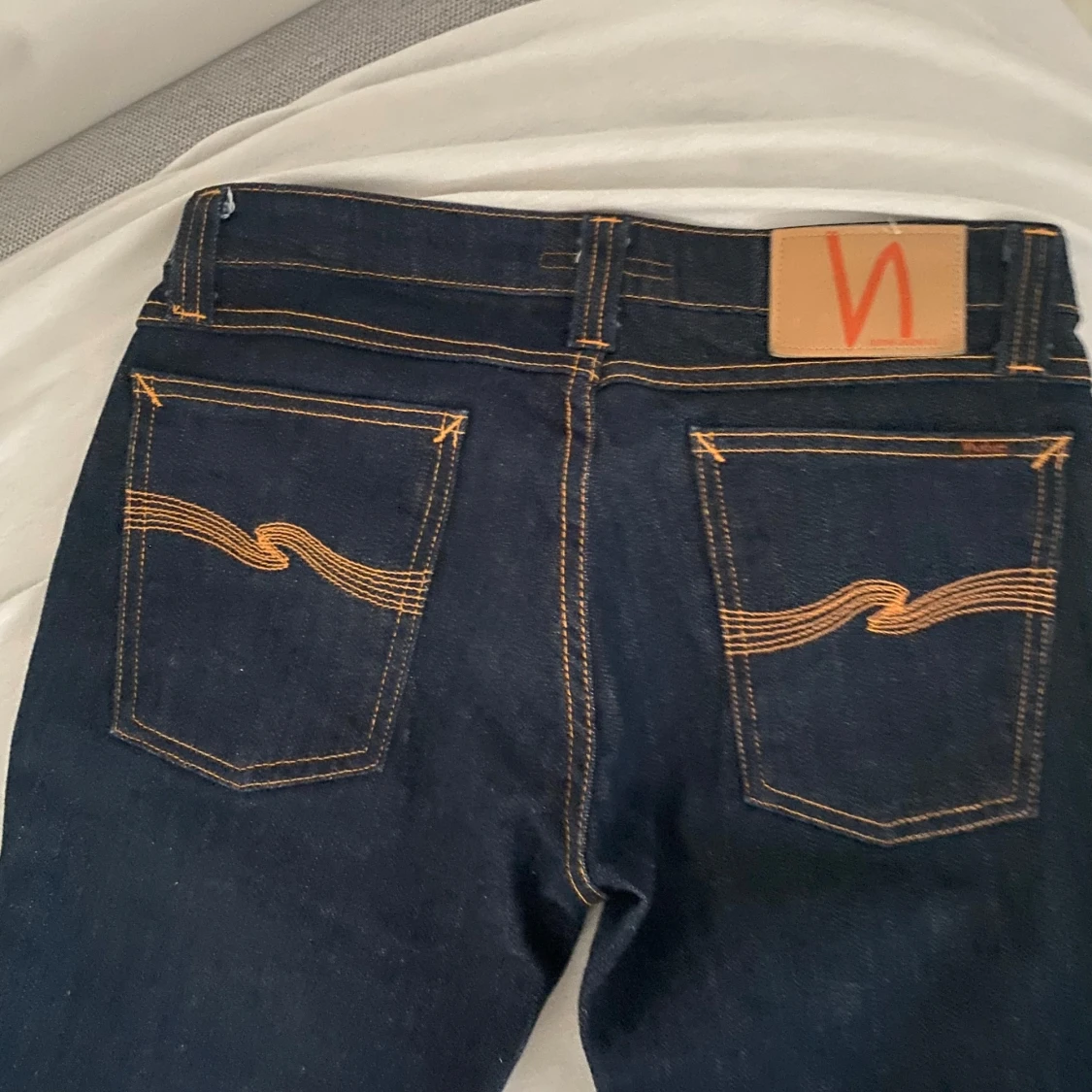 Mörkblåa bootcut jeans - 90