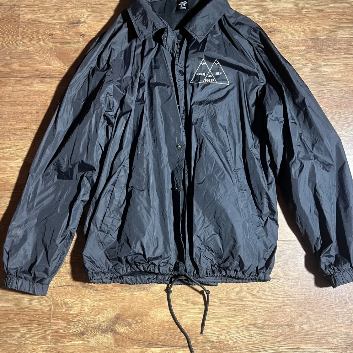 Svart vindjacka från Poler