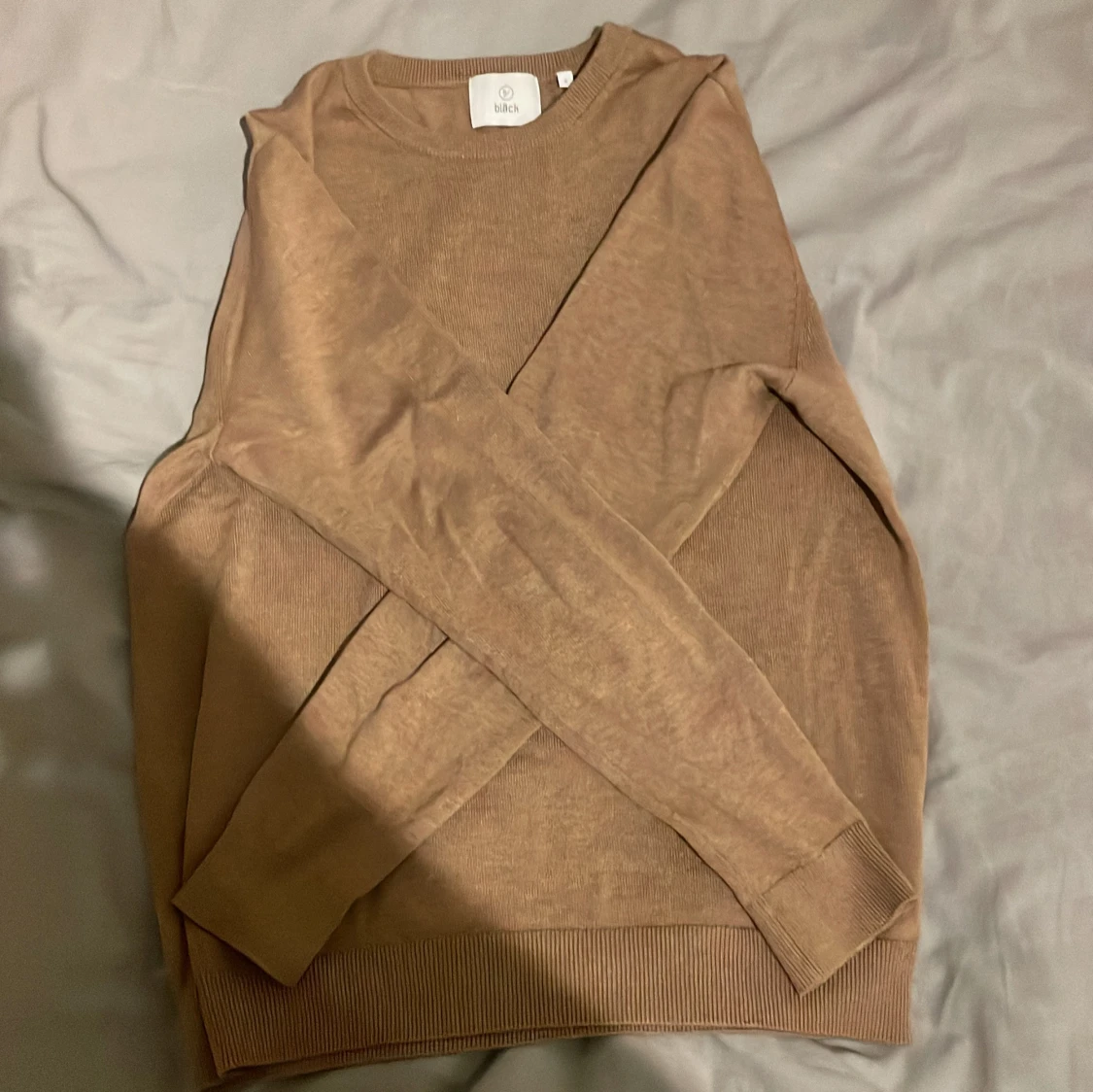 Beige tröja från Bläck