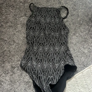 Glittrig body  - Bra skick