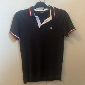 Pikétröja  - Bra skick. Använd fåtal gånger.