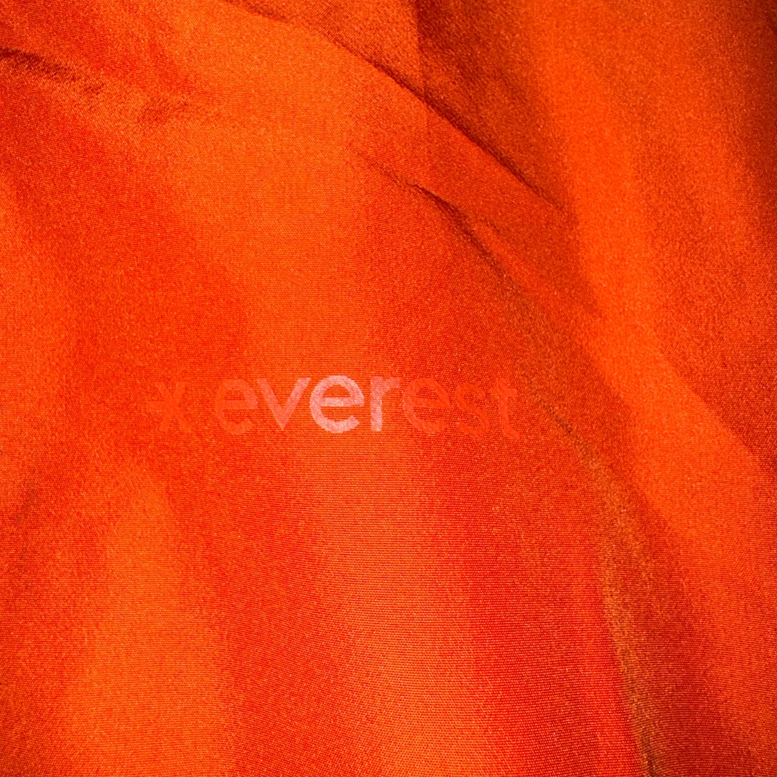 Orange vindjacka från Everest - 90