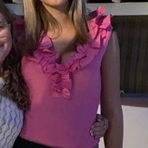 Body - Säljer jätte fin rosa body använd 1 gång. Inga defekter 