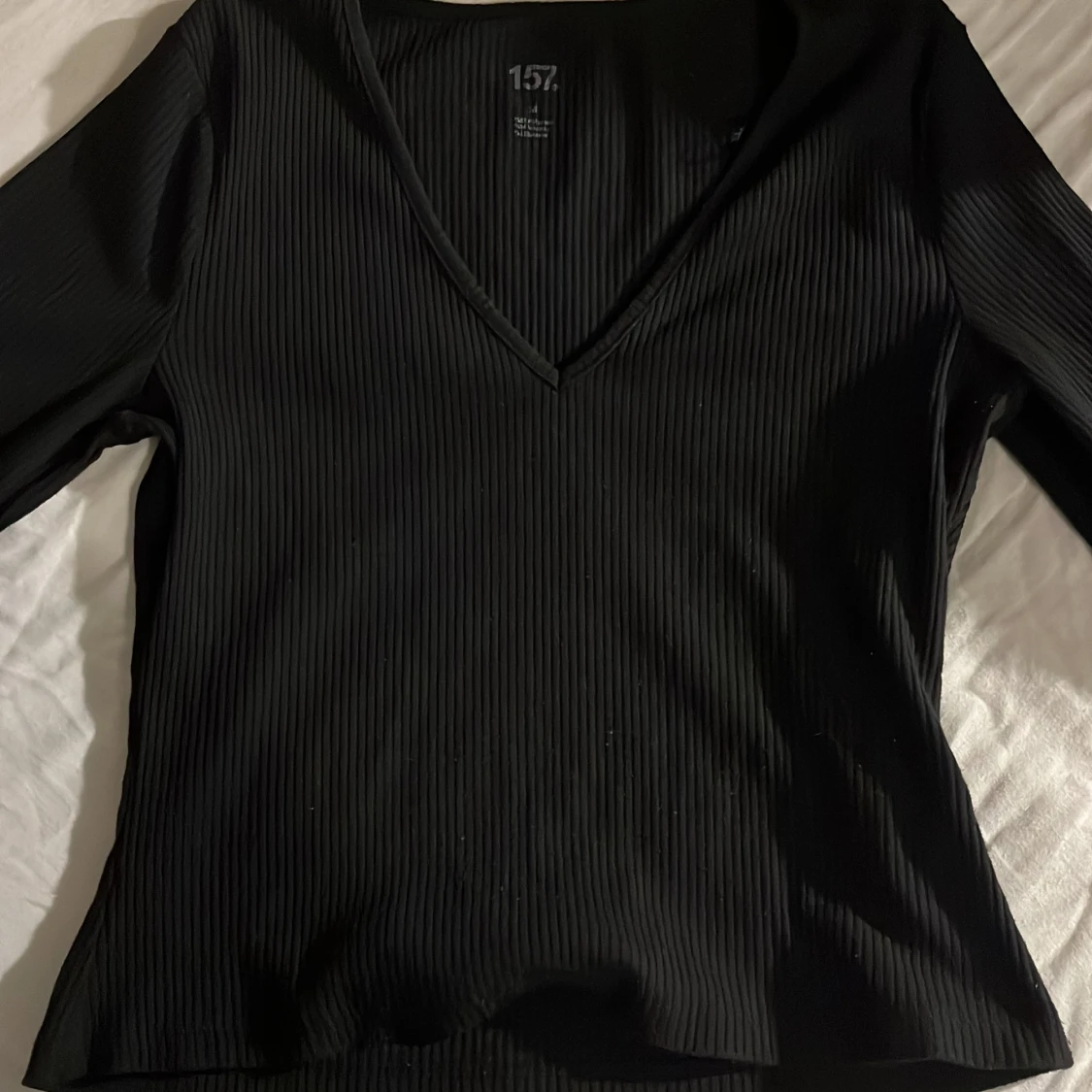 Svart ribbad topp 