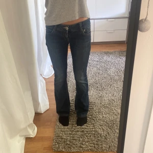 Lågmidjade bootcut jeans - Lågmidjade bootcut jeans