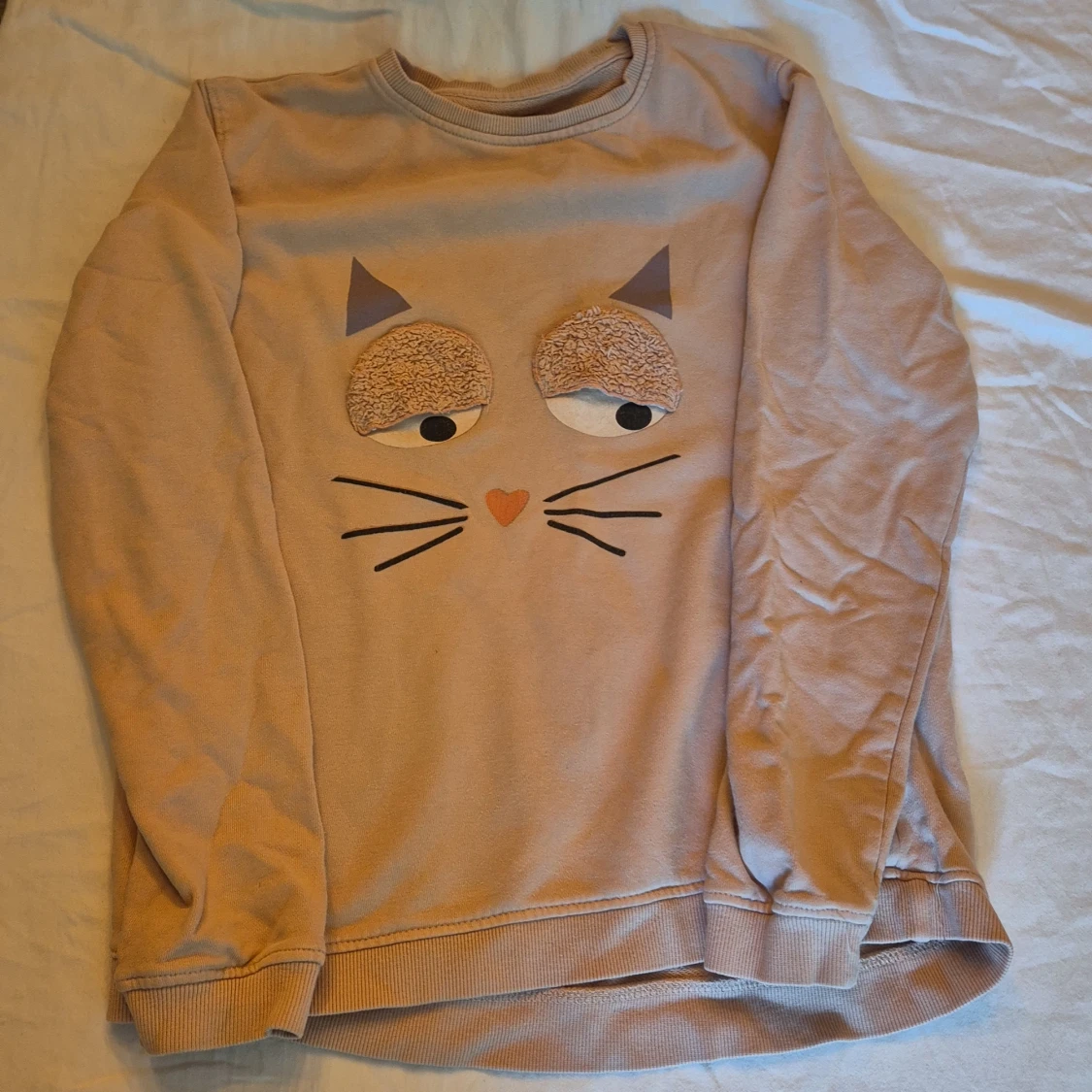 Beige tröja med kattmotiv