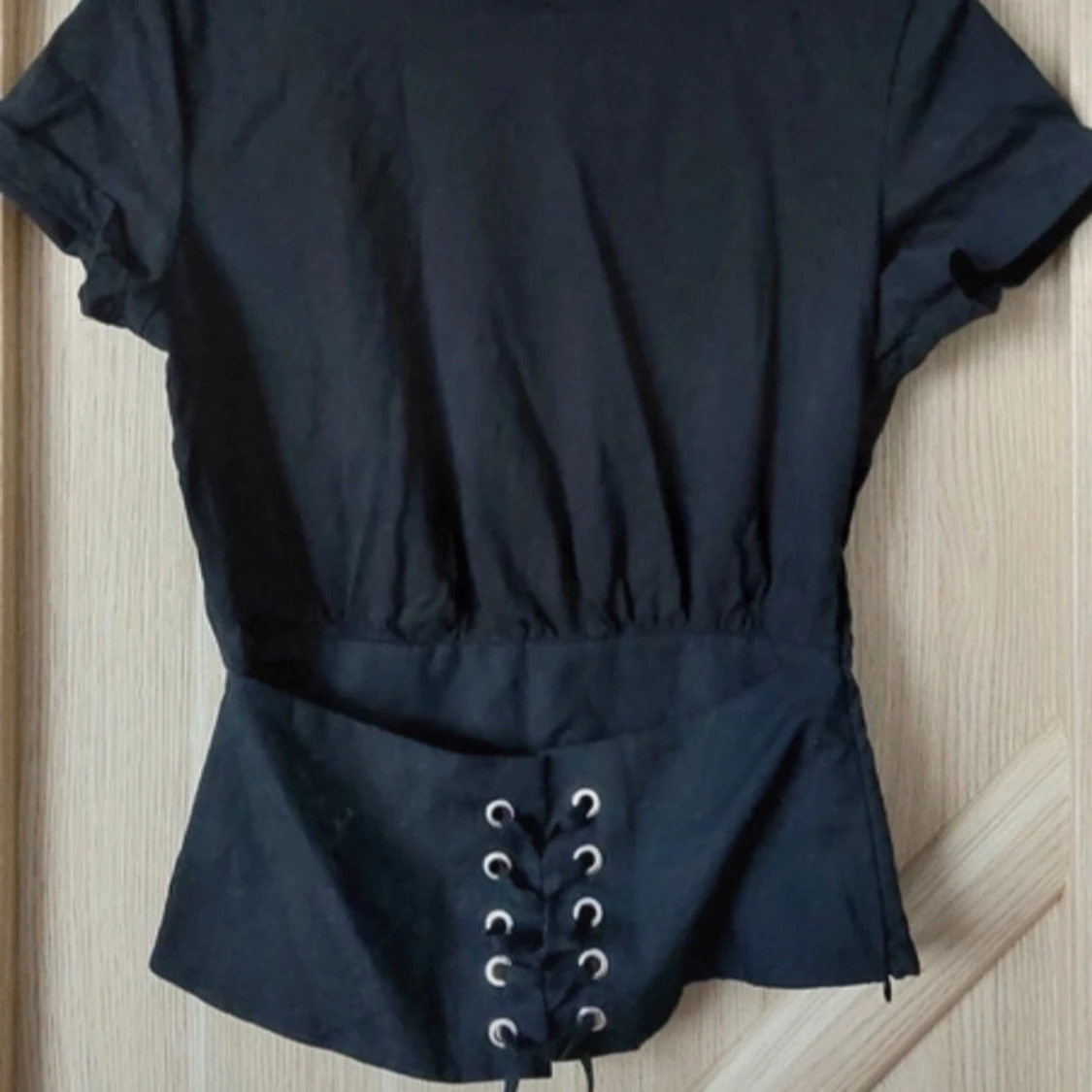 Skitsnygg topp med snörning