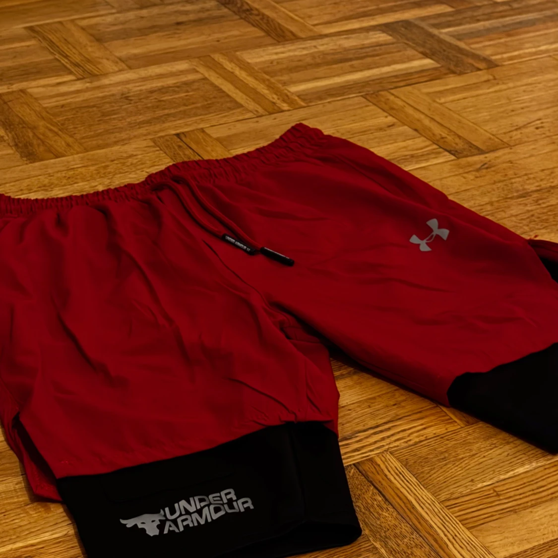 Dubbel träningsshorts från Under Armour - 90