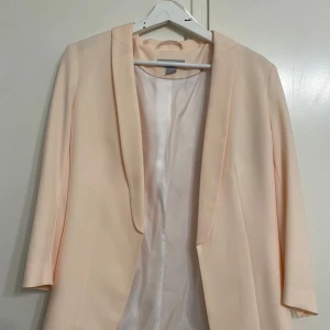 Kavaj  - En fin rosa kavaj 