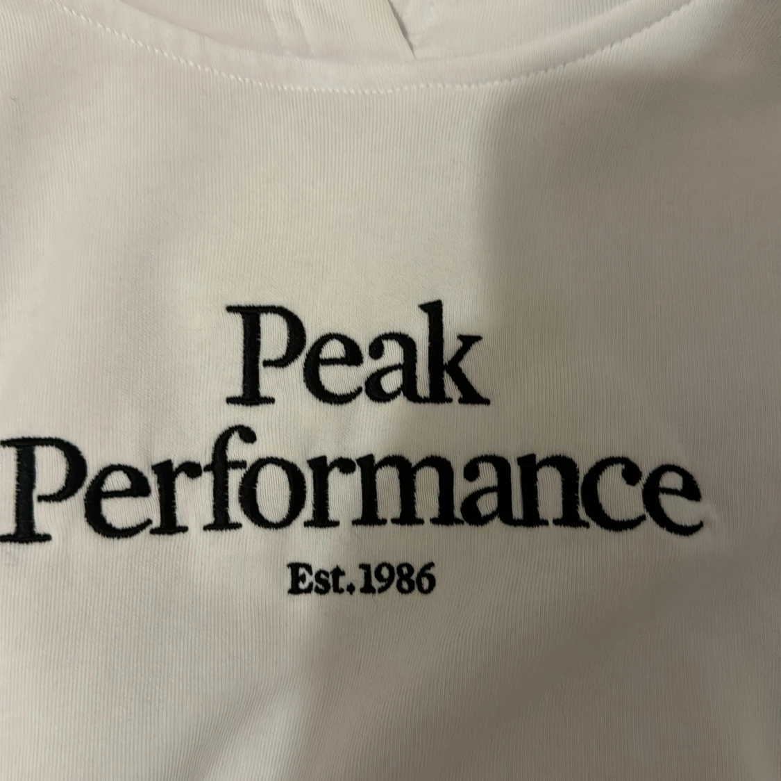 Vit hoodie från Peak Performance - 92