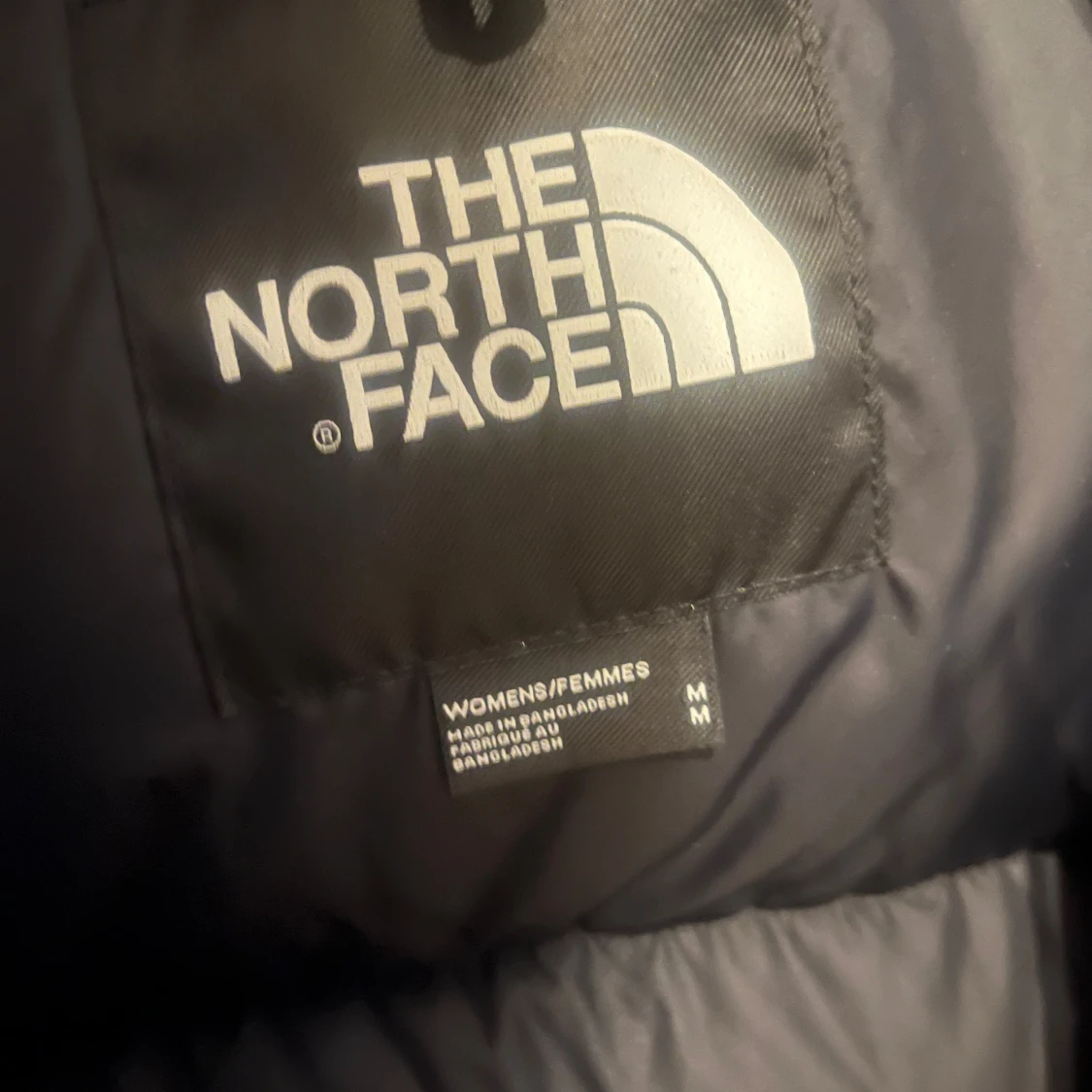 Svart dunjacka från The North Face - 90
