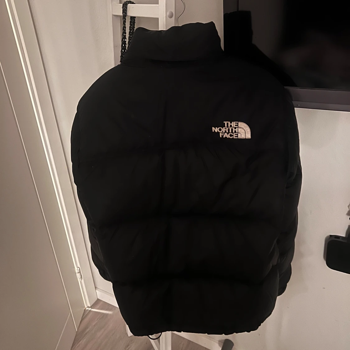 Svart dunjacka från The North Face - 90