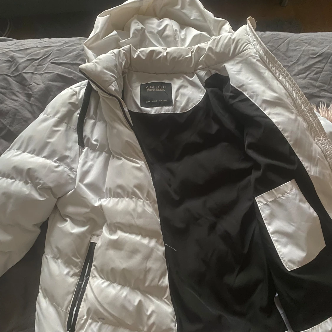 Vit pufferjacka