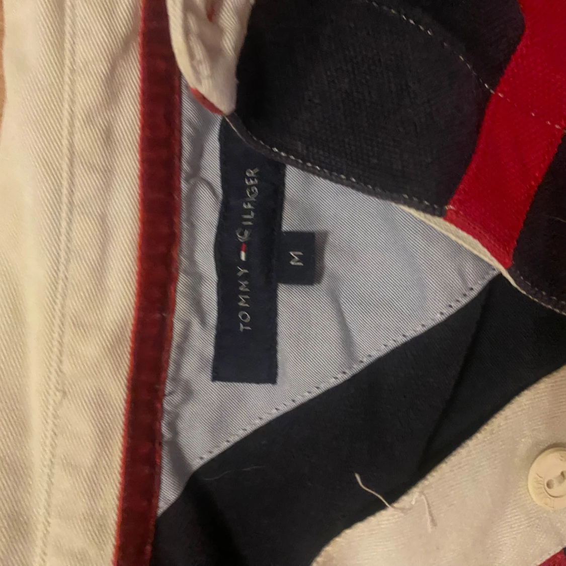Mörkblå pikétröja från Tommy Hilfiger - 91