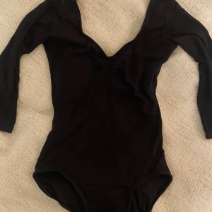 Svart body  - Superfin svart balettbody från worktool, knappt använd 