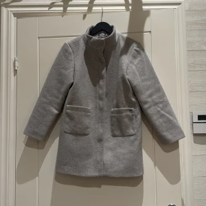 Kappa  - Kappa från Name it  Fint skick 