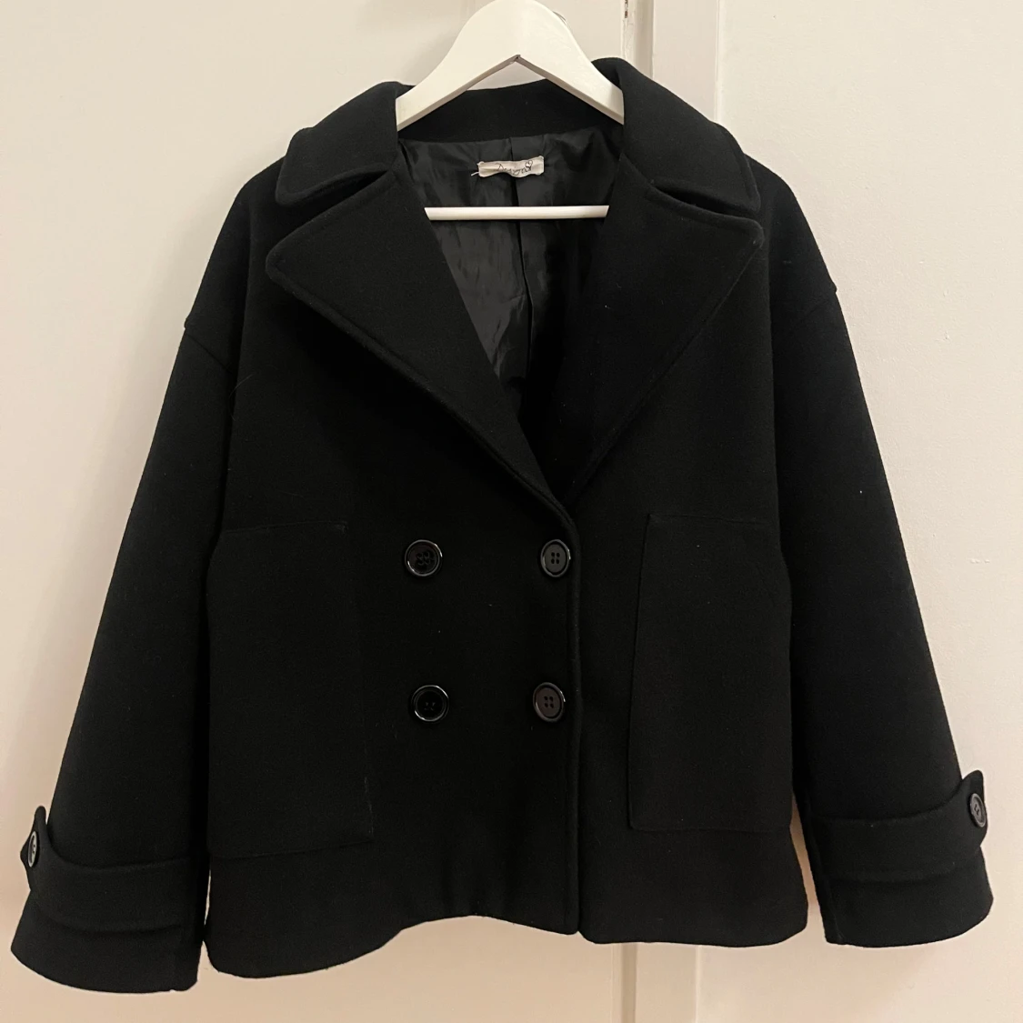 Svart kappa design by si