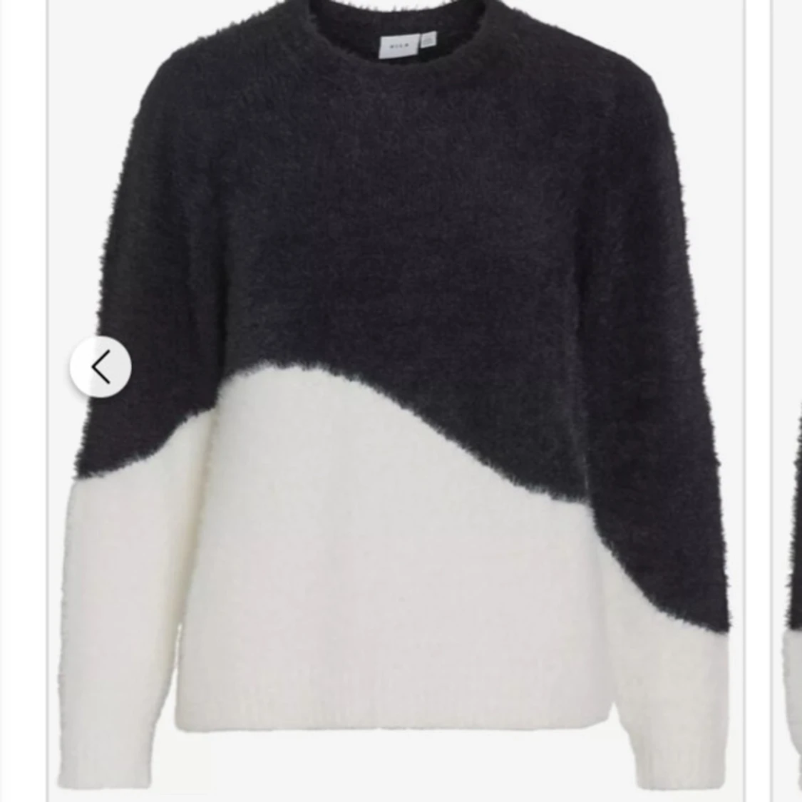 Svart och vit tröja från Vila