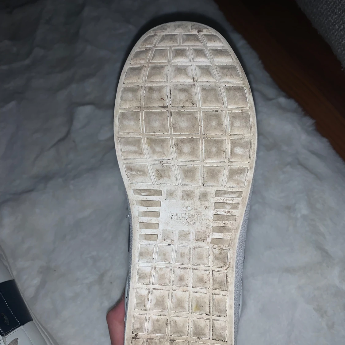 Valentino opens mörk blå