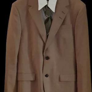 Kavaj Tiger of Sweden italaian sloth - Tiger of Sweden kavaj size EU48 Axelbredd 44 cm, längd 73 cm, armhåla-hand 43 cm, axel-hand 60 cm inga defekter stilsäker pärla