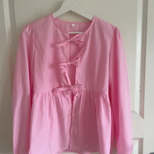 Ljusrosa knyttopp - Köpt på en marknad men får tyvärr ej andvändning för den!