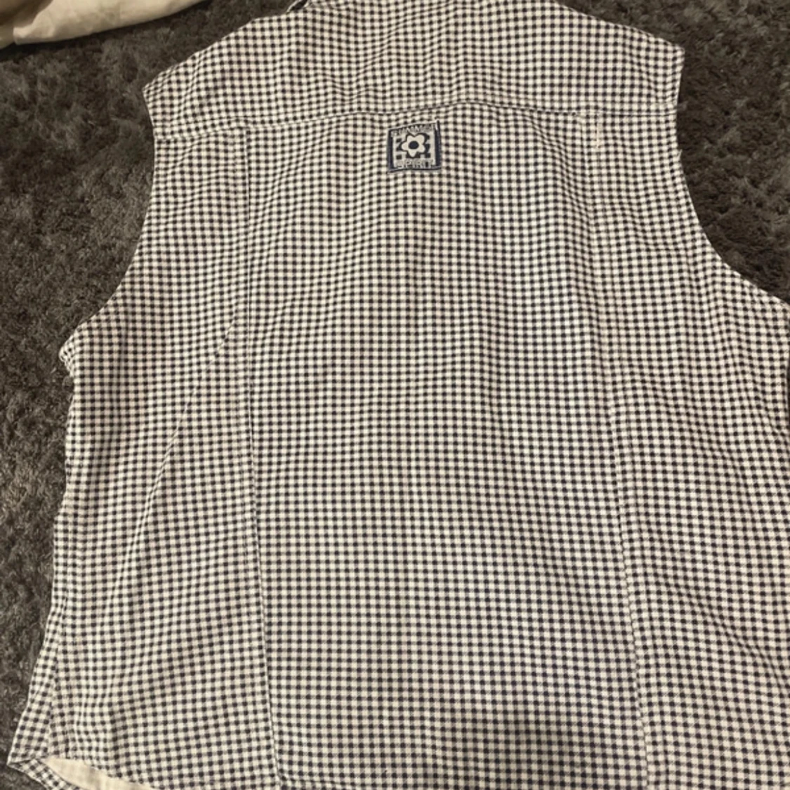 Rutig väst med knappar - 90