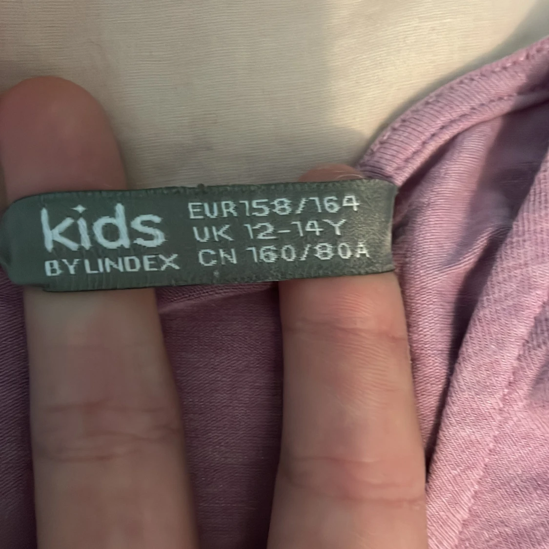 Rosa tröja. Utsvängd  - 91