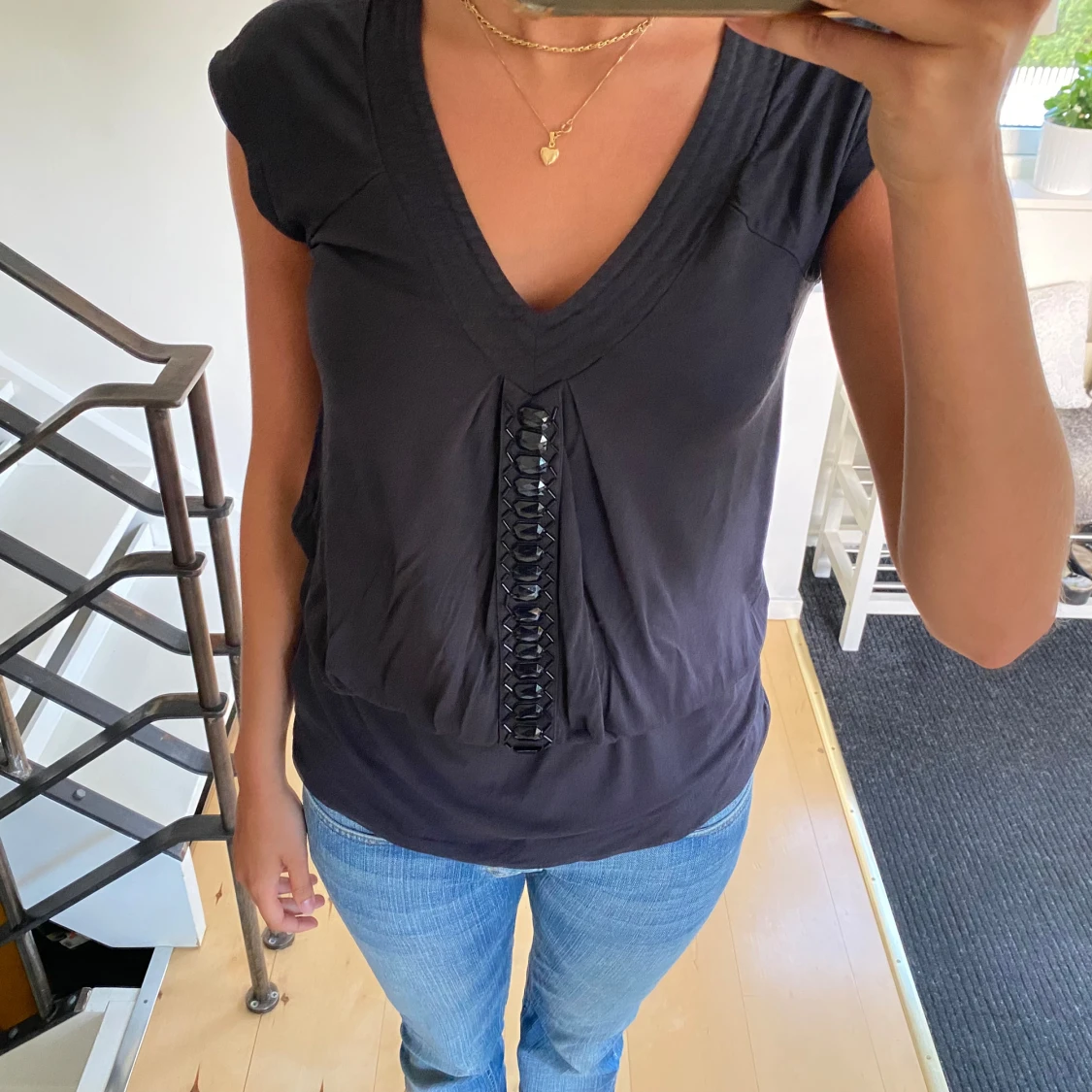 Topp med detaljer - 91