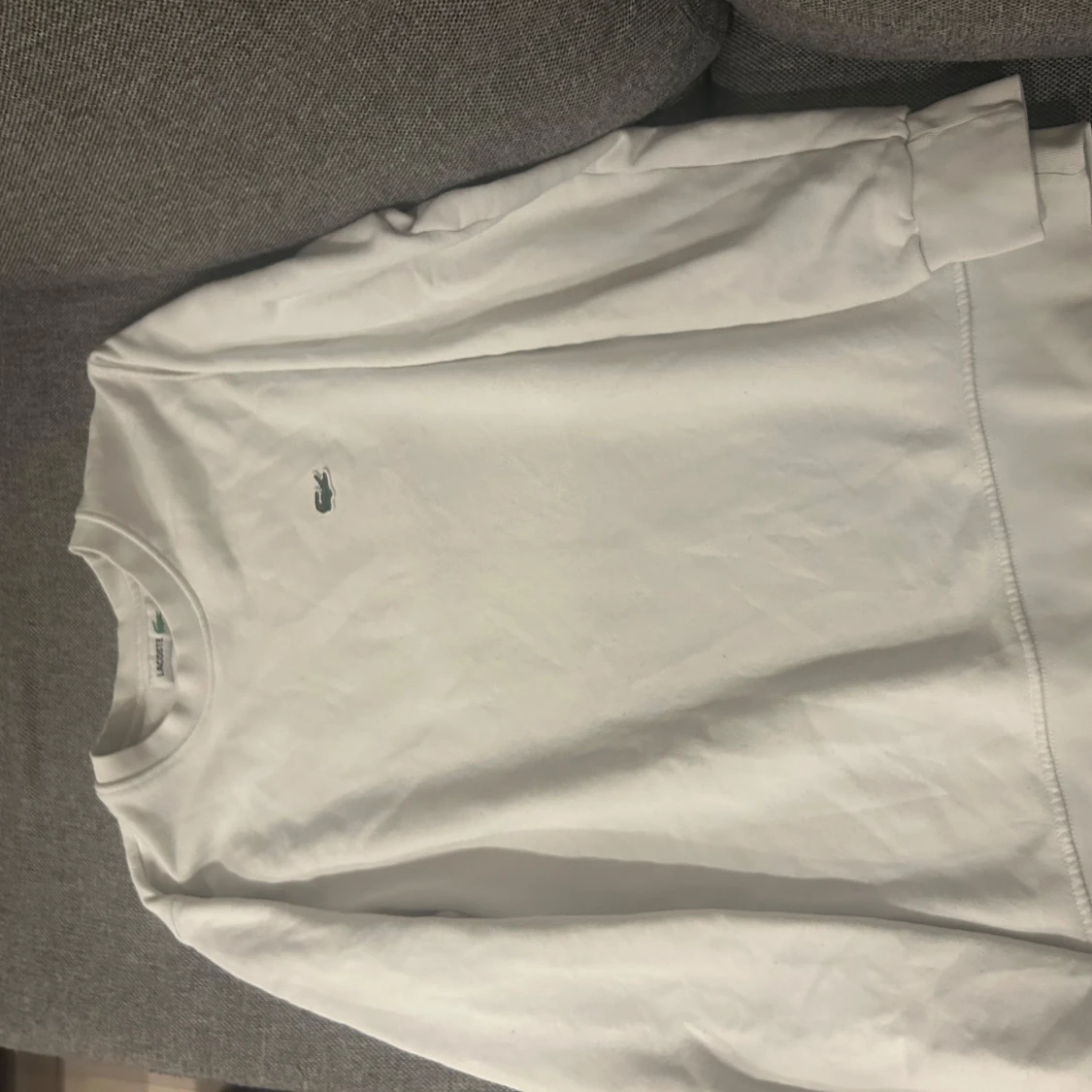 Vit sweatshirt från Lacoste - 90