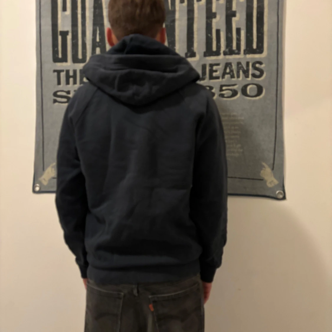 Mörkblå hoodie från Peak Performance