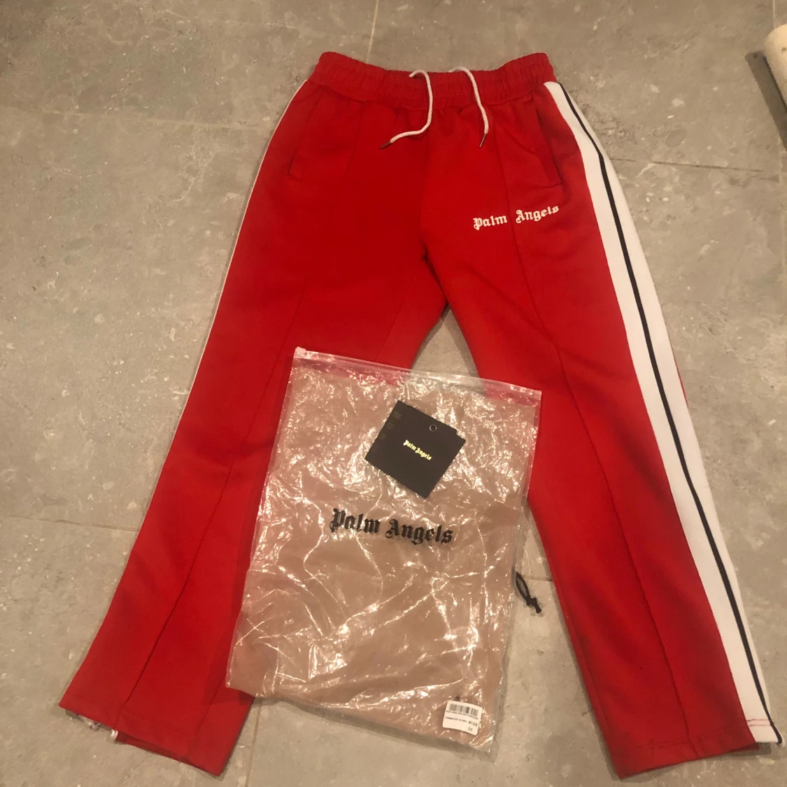 Röda byxor Palm Angels