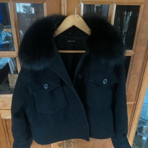 Meotine - Meotine kappa i storlek S nypriset är 3500kr