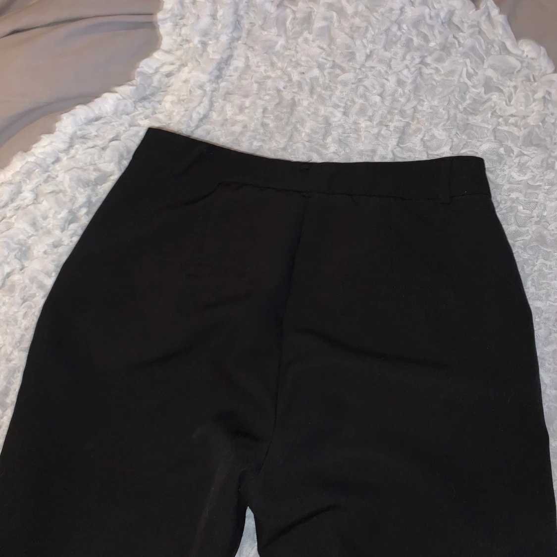 Svarta kostymbyxor  - 91