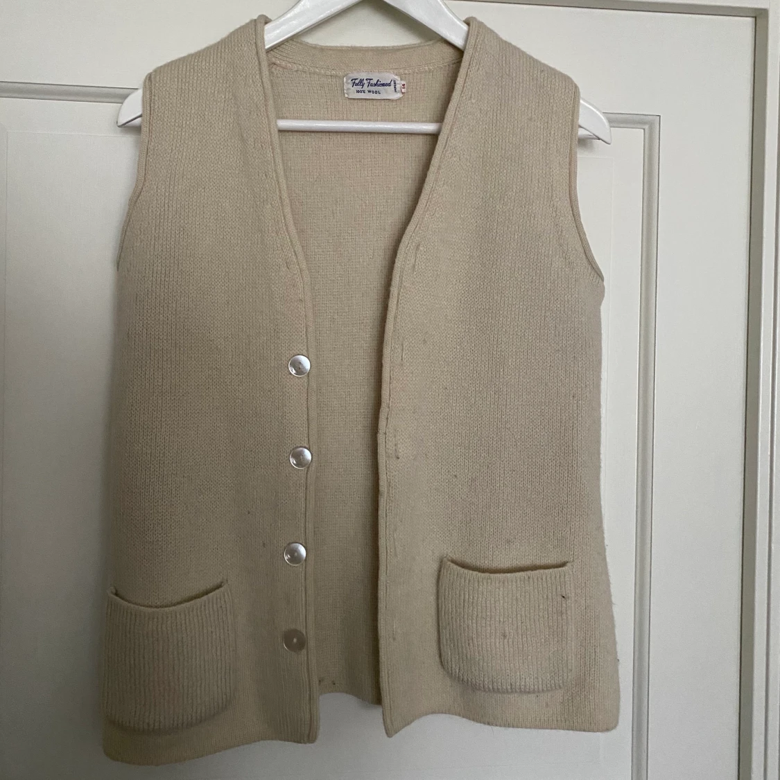 Stickad väst i bomull - 90