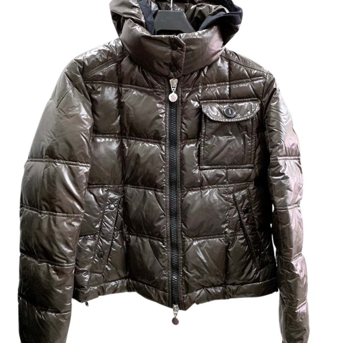 Brun Moncler dunjacka med svart foder