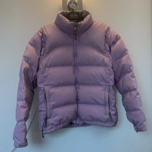 The North Face Jacket LIGHT PURPLE  - TNF 700 Jacket. Really cute color, cannot be found in stores. Shipping price is not included. Paying with swish:)