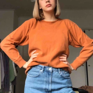  - Orange vintage jumper från märket UNO Danmark. Frakt 40kr!