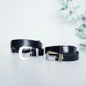  - Två par skärp, det silvriga köpt på Gina Tricot och det guldiga är vintage. One Size på dessa, säljs för 50 kronor + 40 kronor frakt.