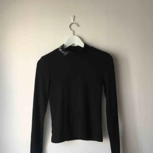  - En fin Turtle neck från Gina Tricot. 