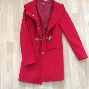 Red coat, really warm and works all year around except summer. The price can be discussed. 