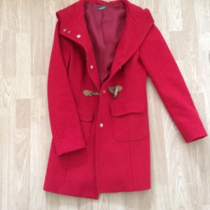  - Red coat, really warm and works all year around except summer. The price can be discussed. 