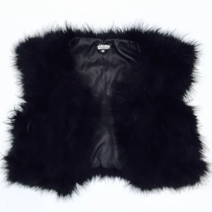  - Svart väst i dun, bra skick, knappt använd!