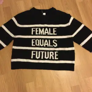 Superskön ”Female equals future” stickad tröja aldrig andvänd. Fick i julklapp. Buda om pris, välj fraktpris själv.