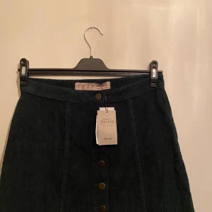 Grön manchester kjol - Oanvänd kjol , köpt i London om jag inte minns fel